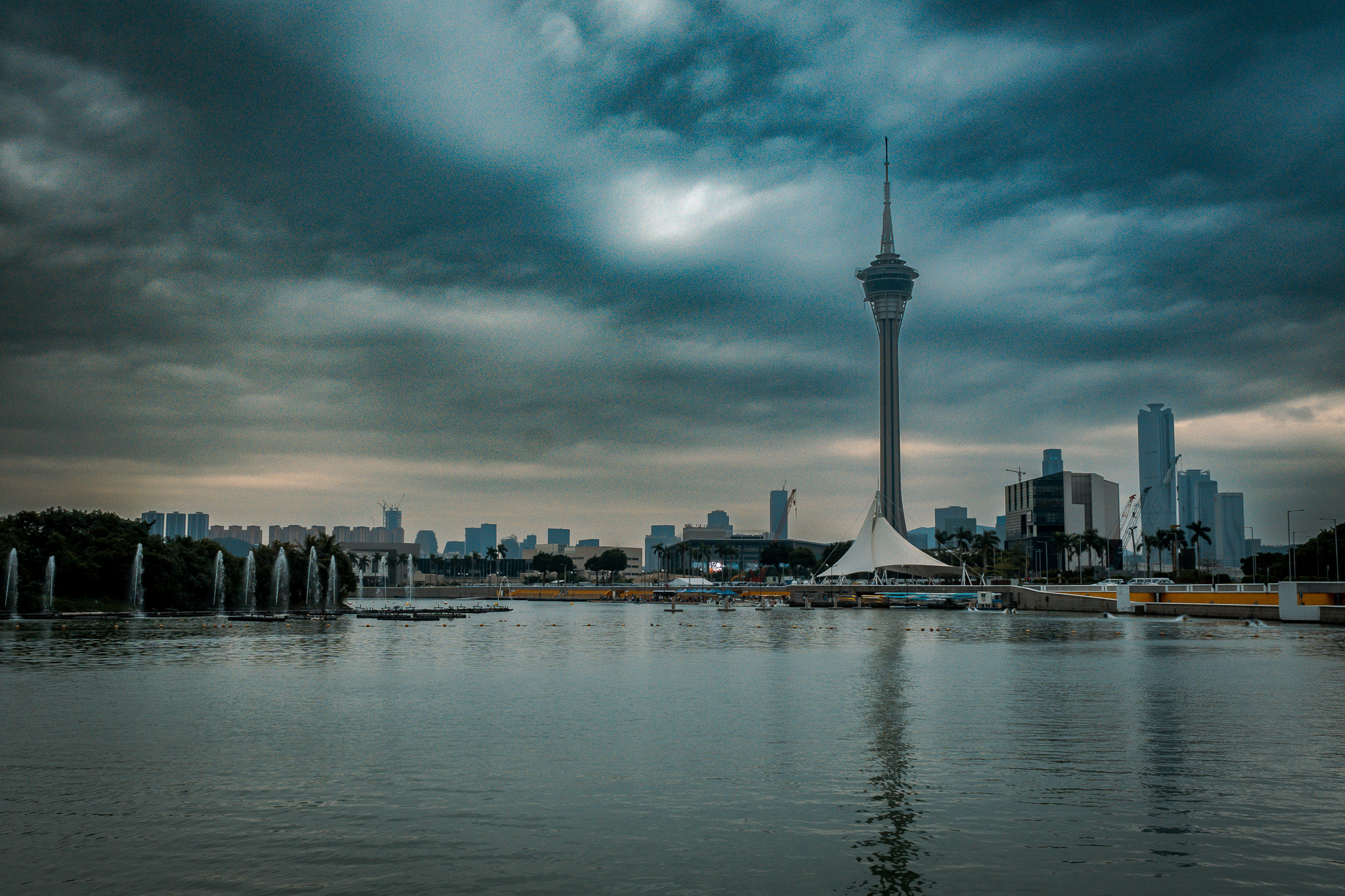 Macau skyline under dark clouds